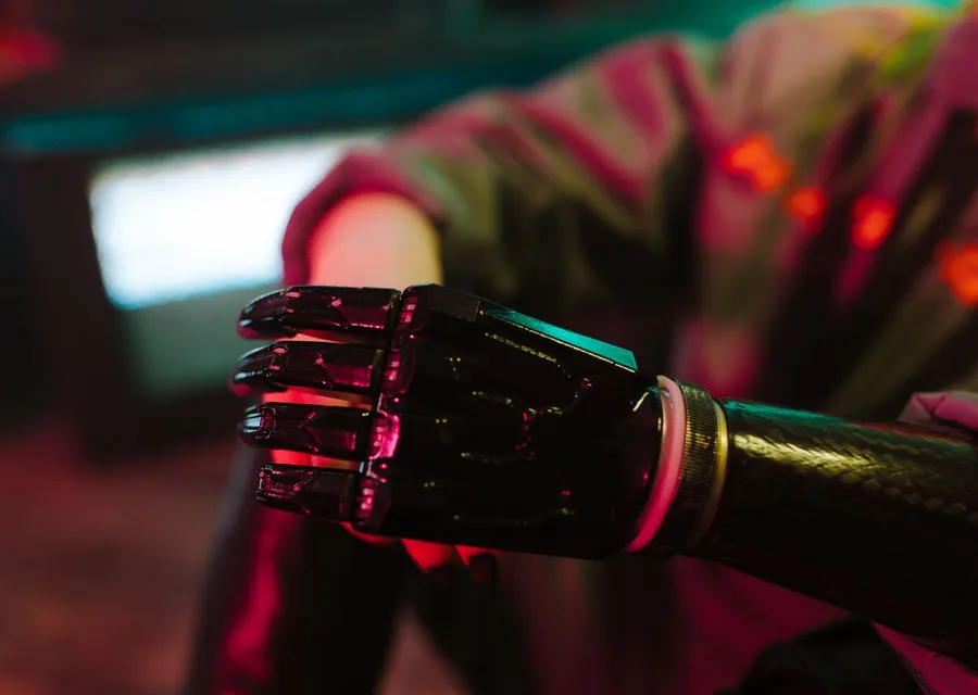 Robotic hand representing AI automation technology behind solutions